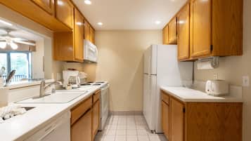 Suite, 2 Bedrooms, Non Smoking | Private kitchen | Full-sized fridge, microwave, oven, stovetop