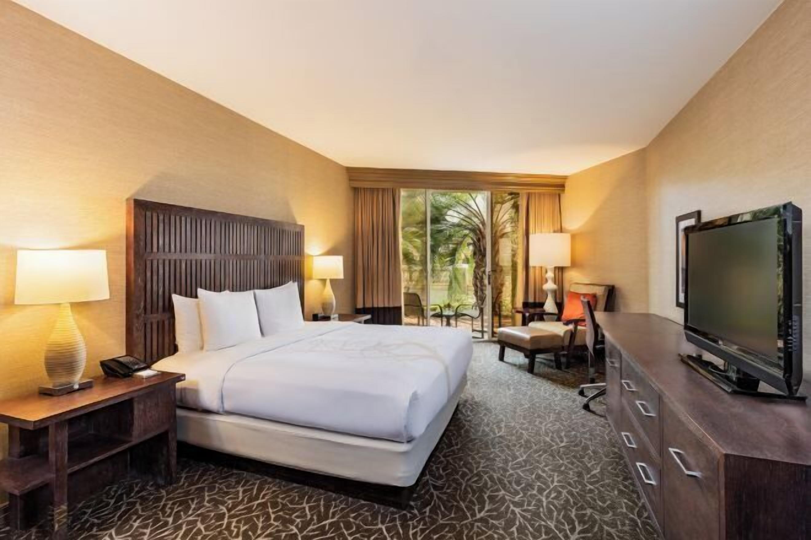 Premium bedding, down comforters, in-room safe, desk