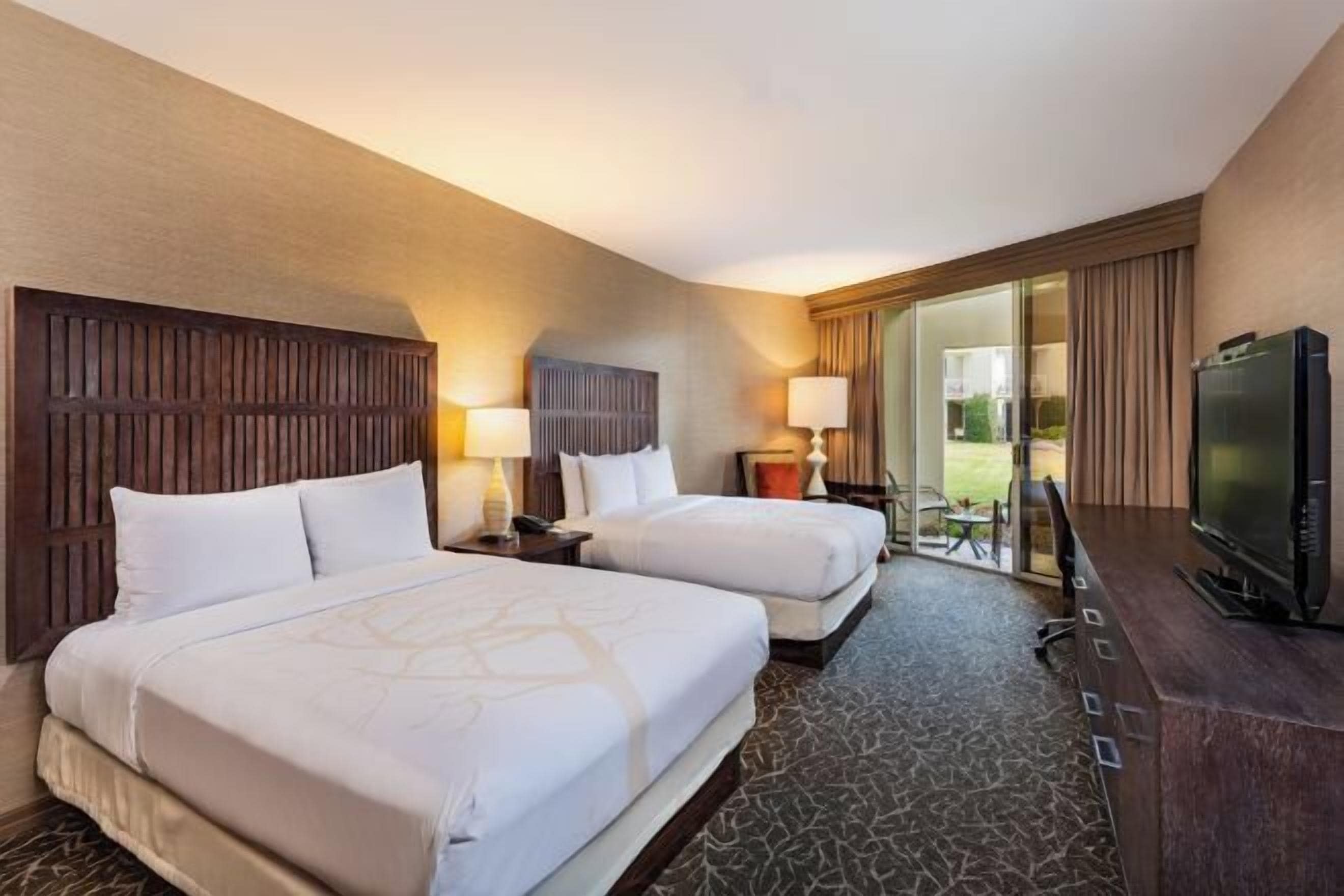 Premium bedding, down comforters, in-room safe, desk