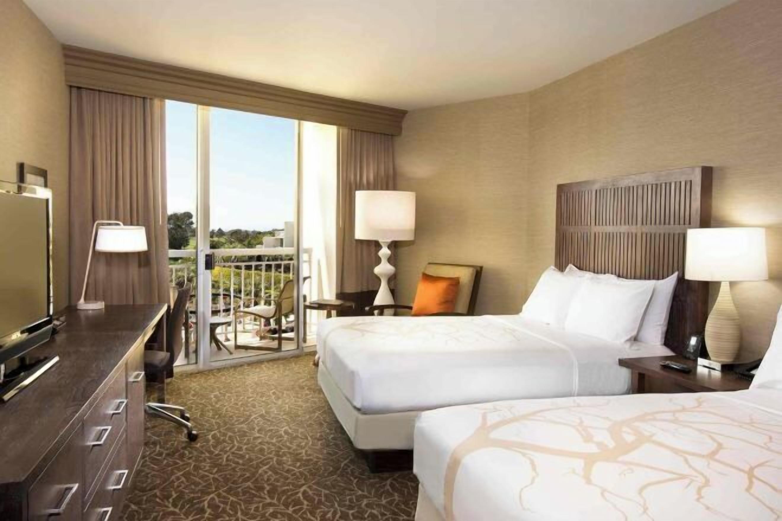 Premium bedding, down comforters, in-room safe, desk