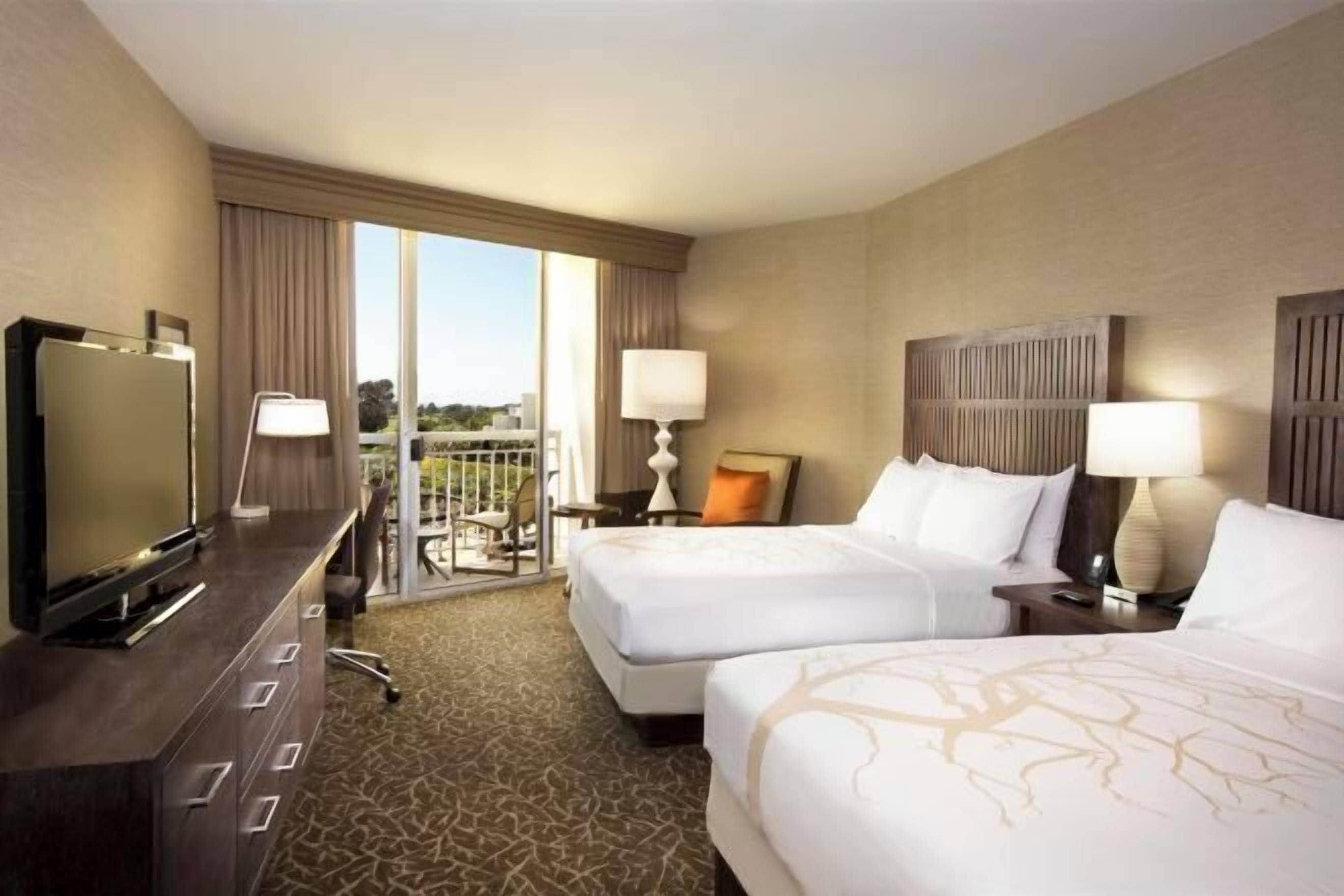 Premium bedding, down comforters, in-room safe, desk