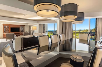 Suite, 1 King Bed (The Champion Suite) | Living area | 55-inch flat-screen TV with cable channels, TV, pay movies at Hilton La Jolla Torrey Pines