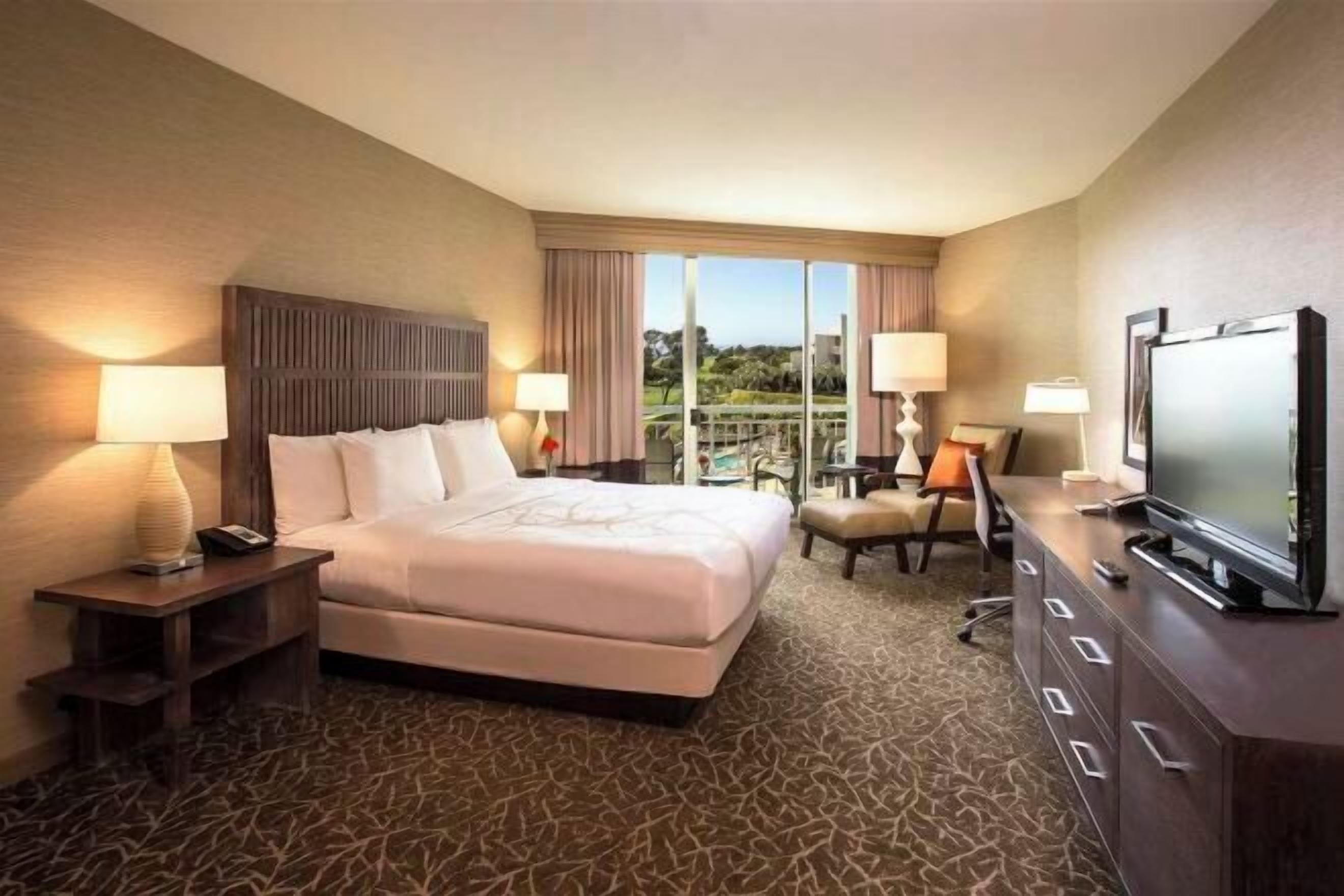 Premium bedding, down comforters, in-room safe, desk