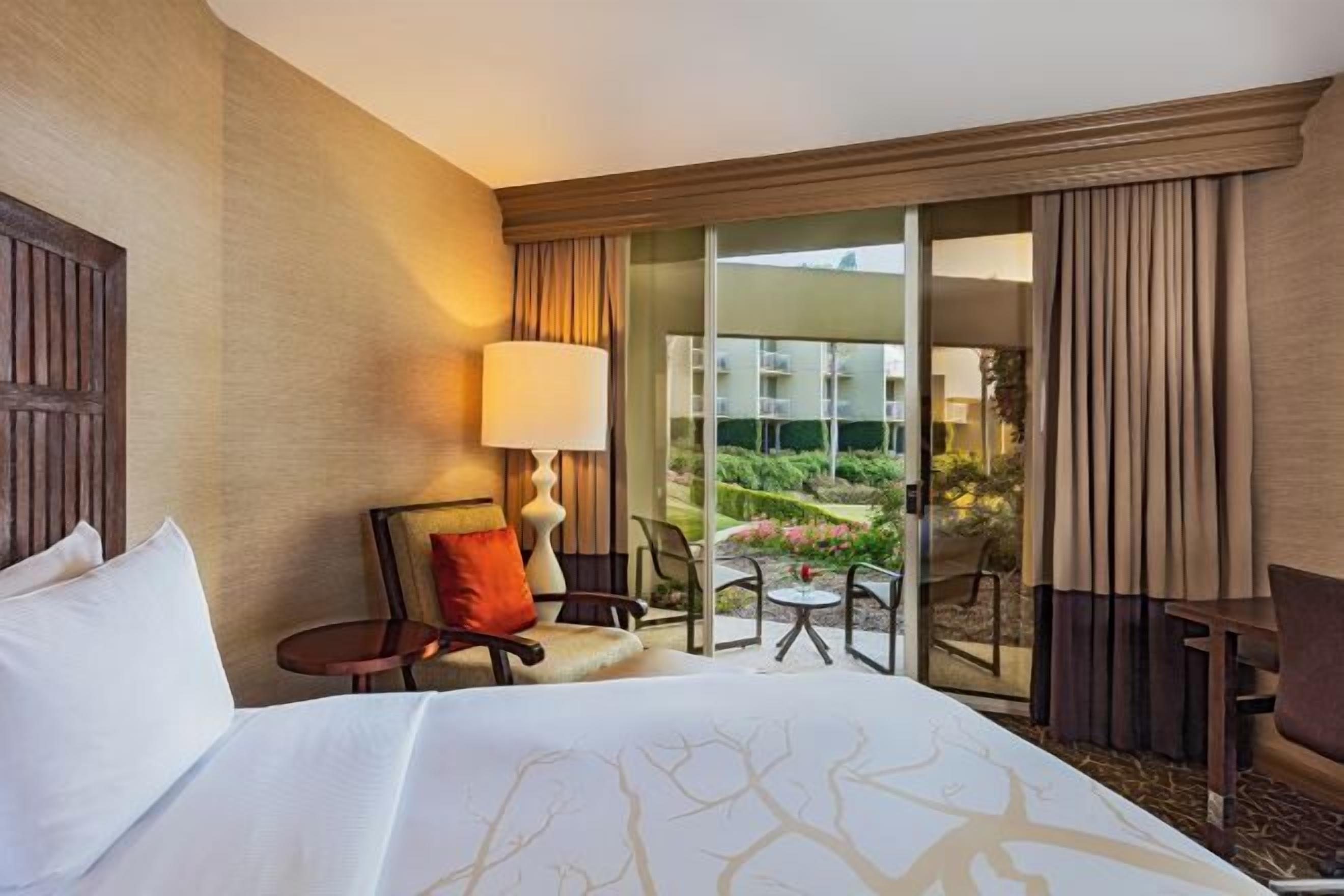 Premium bedding, down comforters, in-room safe, desk