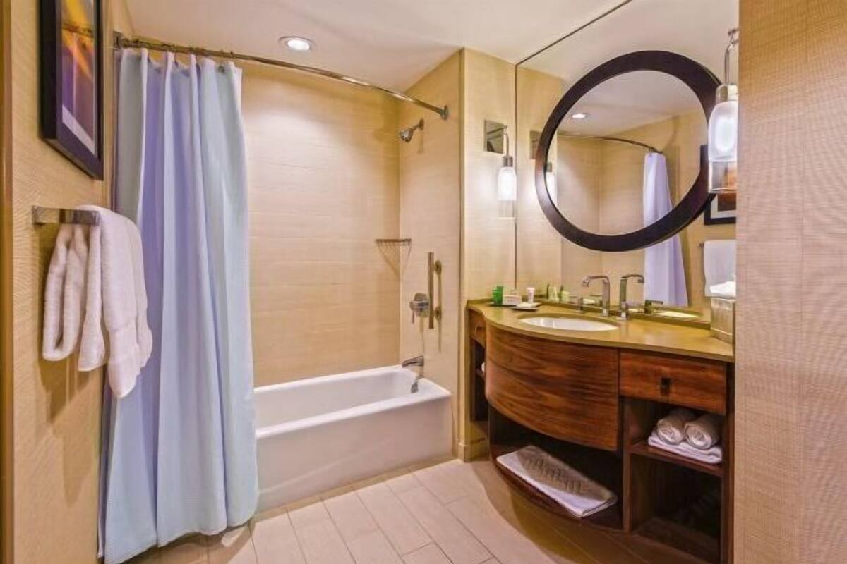 Rainfall showerhead, free toiletries, hair dryer, towels