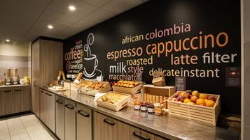 Enjoy a wide selection of bread, pastries, and fresh fruits at our buffet.