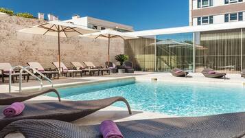 Outdoor pool, open 8:00 AM to 8:00 PM, pool umbrellas, sun loungers