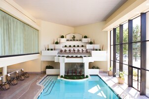 Indoor pool, open 10:00 AM to 10:00 PM, sun loungers