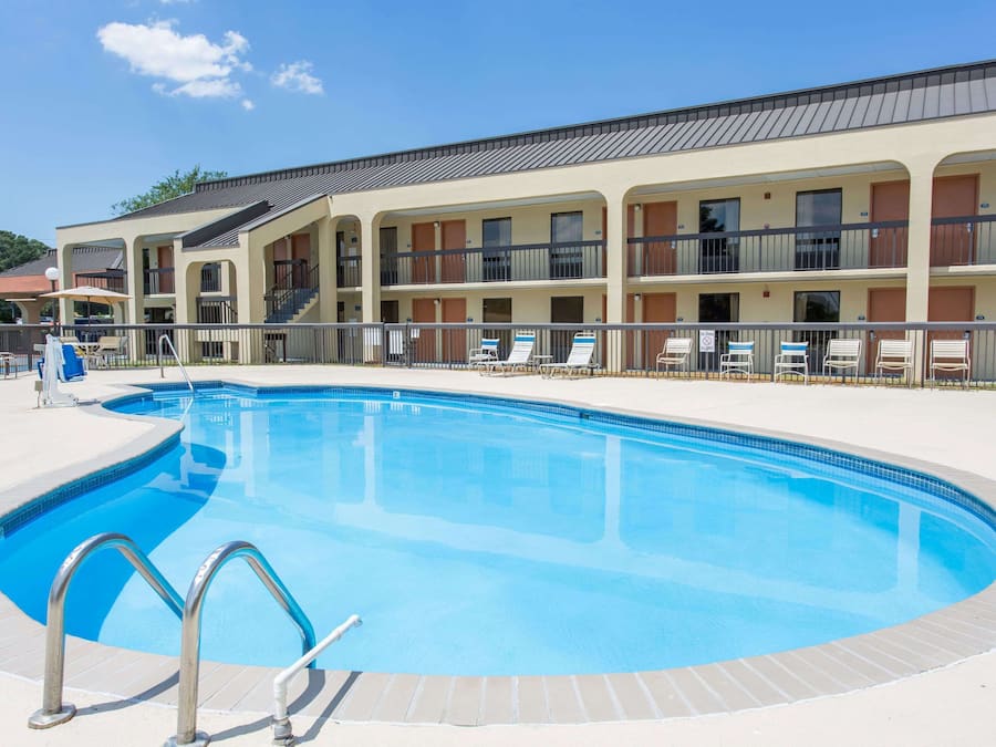 Seasonal outdoor pool, open 10 AM to 6:00 PM, pool umbrellas