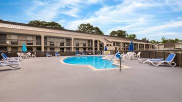 Seasonal outdoor pool, open 10 AM to 6:00 PM, pool umbrellas