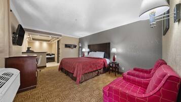 Premium bedding, desk, laptop workspace, iron/ironing board