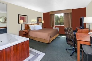 Suite, 1 King Bed, Non Smoking | In-room safe, desk, blackout drapes, iron/ironing board