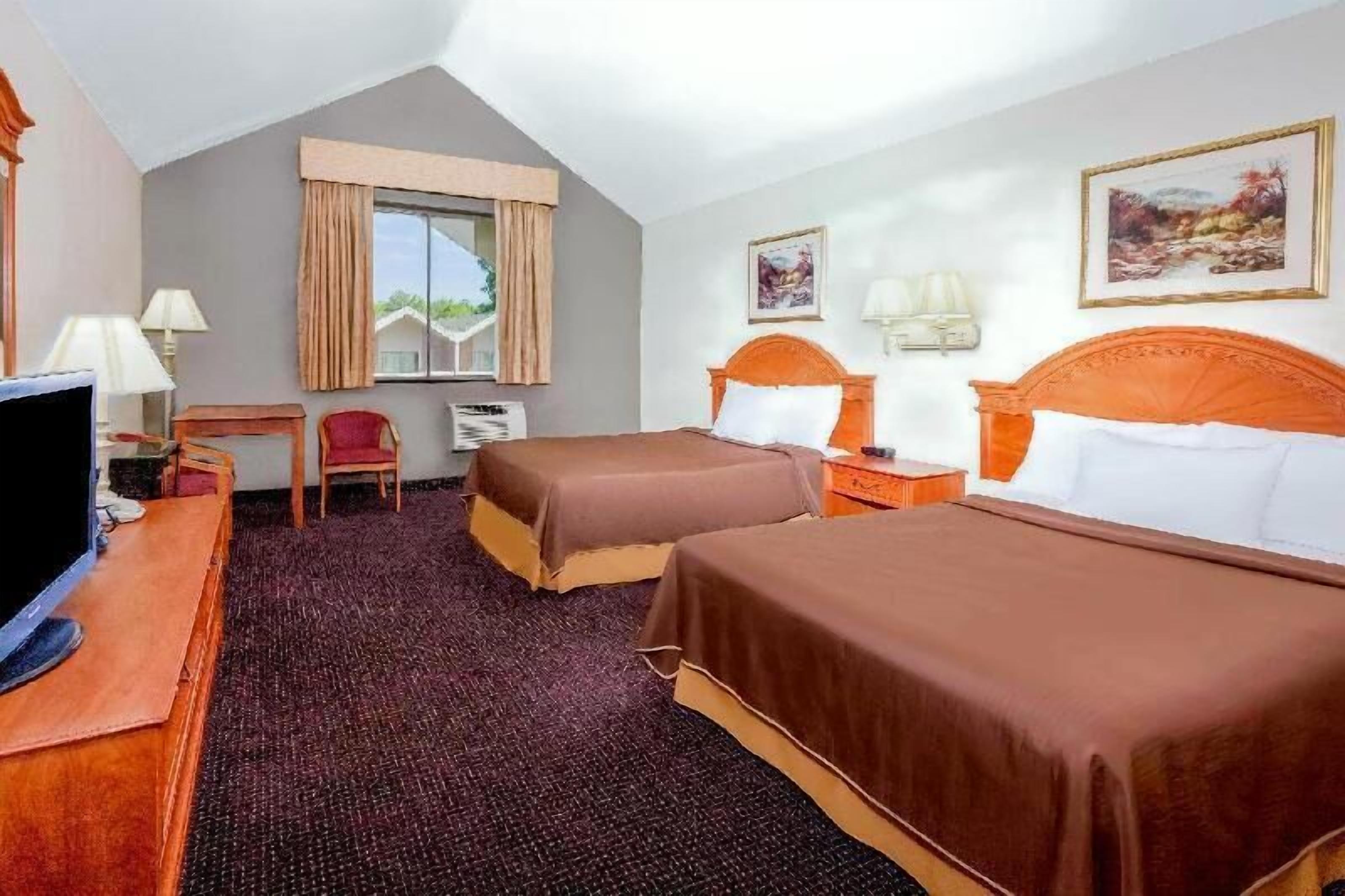 In-room safe, desk, blackout curtains, iron/ironing board
