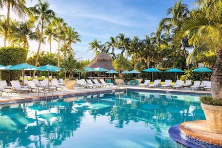 Outdoor pool, a heated pool, open 8:00 AM to 8:00 PM, pool umbrellas. The Palms Hotel & Spa