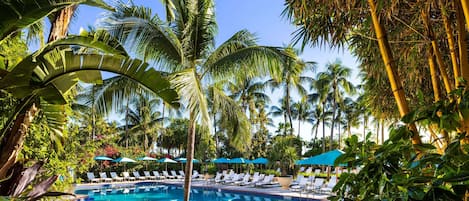 Outdoor pool, a heated pool, pool umbrellas