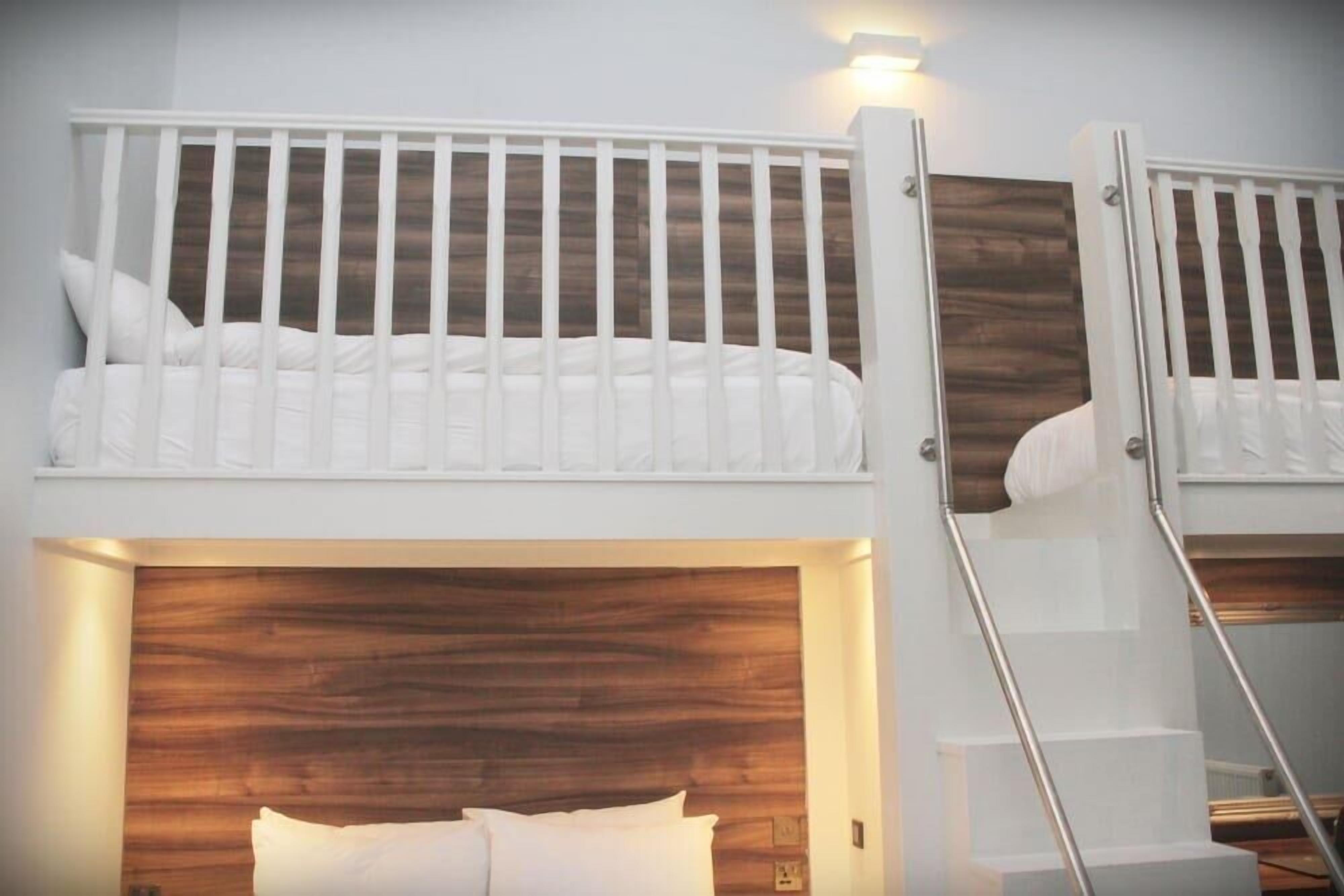 Family Room | Premium bedding, pillow-top beds, individually furnished, desk