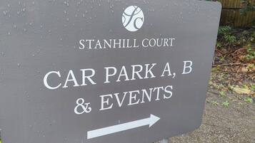 A sign for Stanhill Court's Car Park A, B & Events.