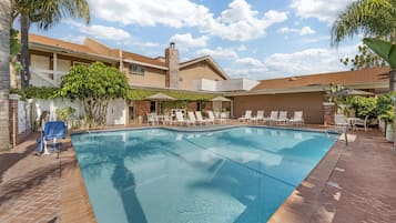 Outdoor pool, open 9:00 AM to 10:00 PM, pool umbrellas, sun loungers