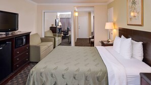 Premium bedding, desk, laptop workspace, blackout drapes - Quality Inn & Suites Montebello - Los Angeles (Montebello)
