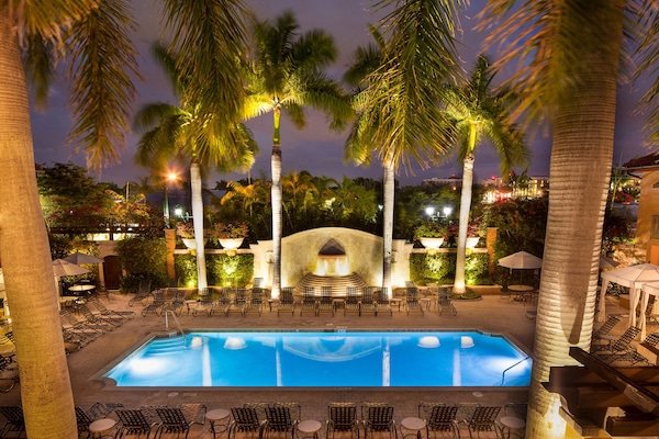 Outdoor pool, open 9:00 AM to 8:00 PM, free pool cabanas, pool loungers
