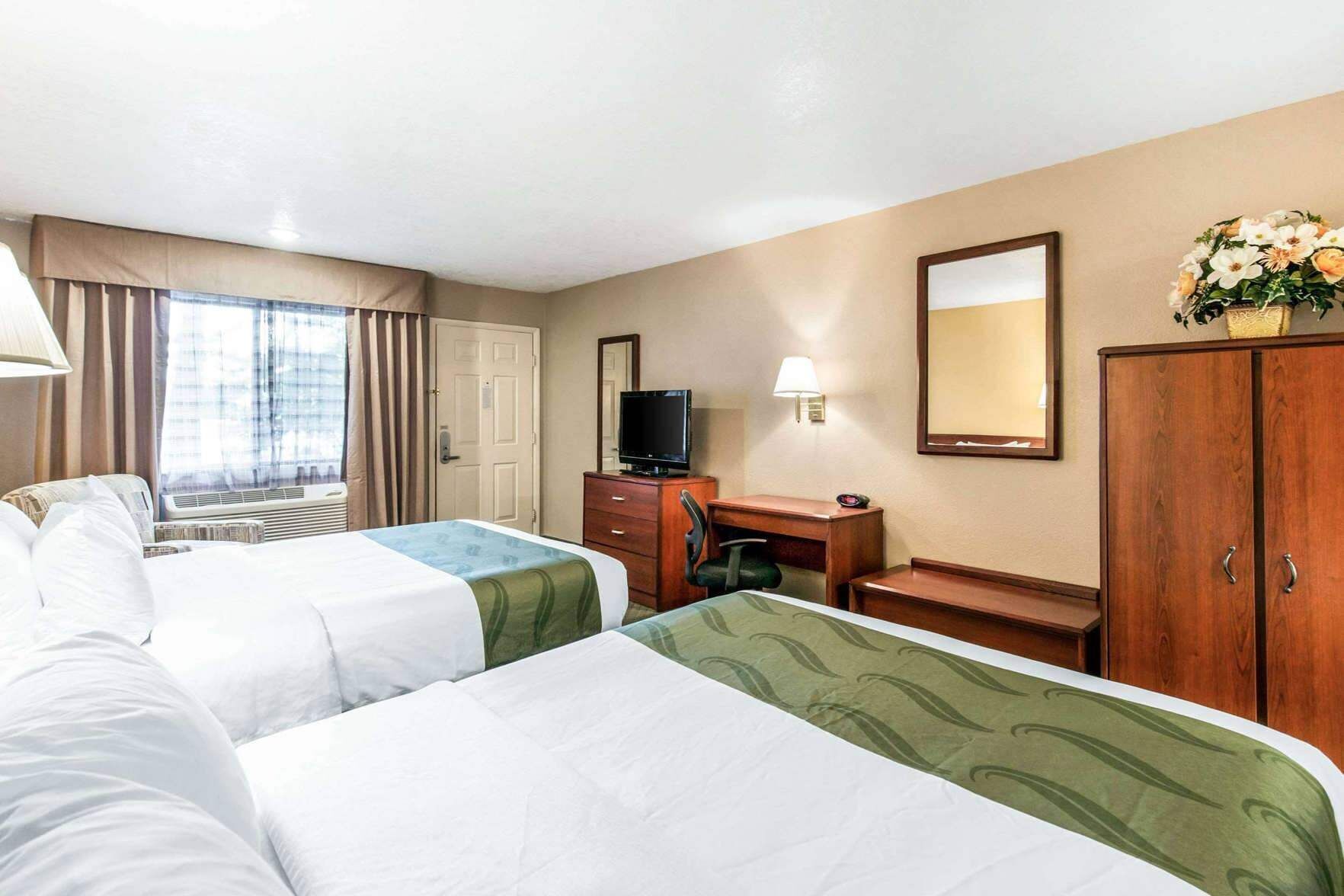 Premium bedding, down comforters, pillowtop beds, desk