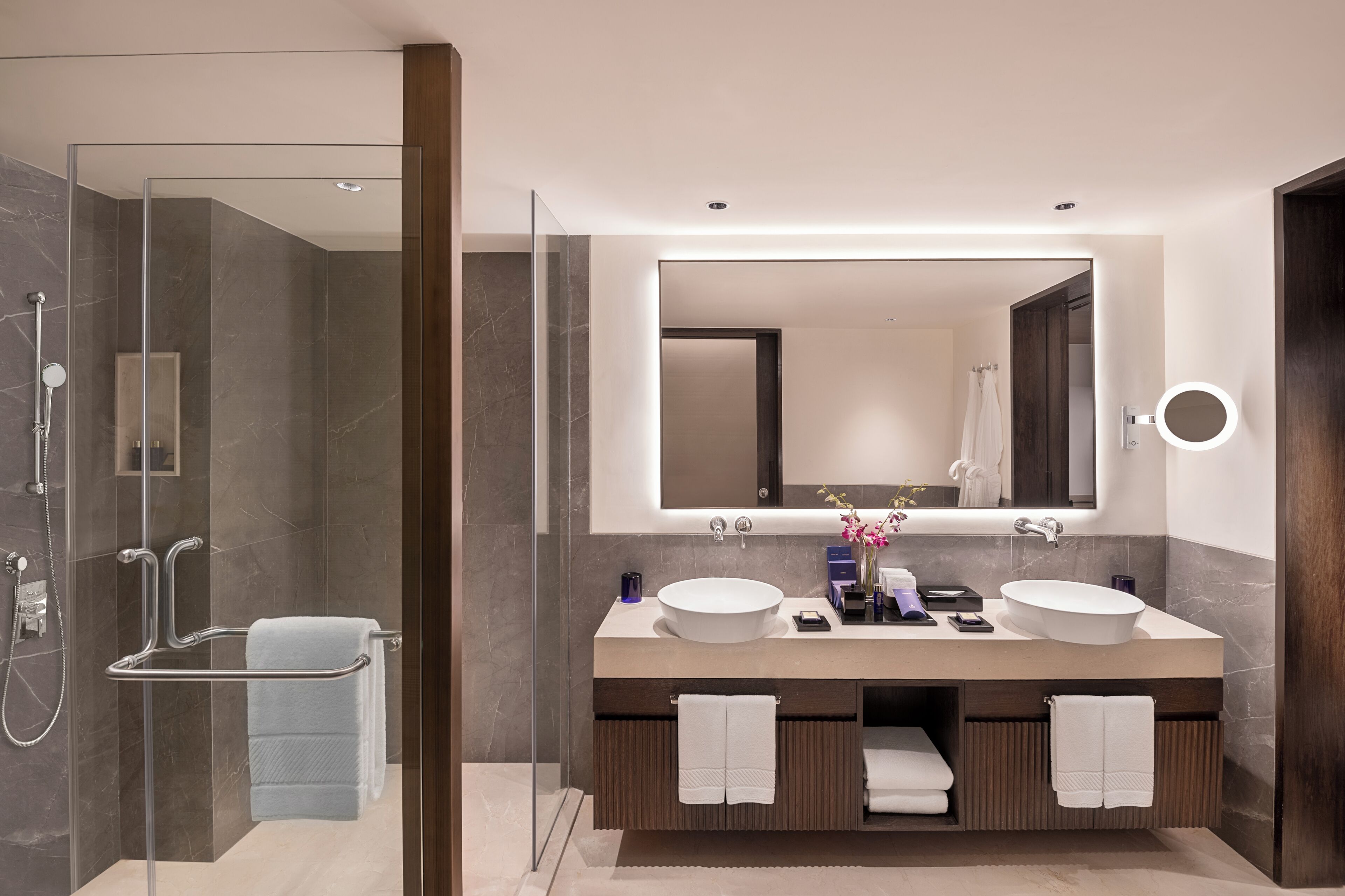 luxury residential suite | bathroom | separate bathtub and shower, deep-soaking bathtub, designer toiletries