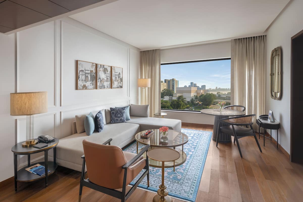 Premier Suite, Bay View | Living room | 40-inch LCD TV with digital channels, TV, iPod dock