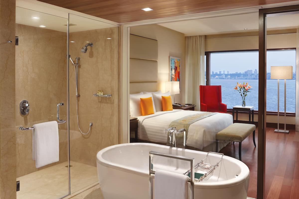 separate bathtub and shower, deep-soaking bathtub, designer toiletries