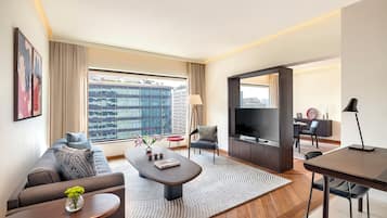 Luxury Residential Suite | Living area | 40-inch LCD TV with digital channels, TV, iPod dock
