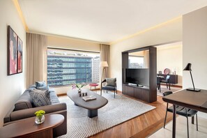 Luxury Residential Suite | Living area | 40-inch LCD TV with digital channels, TV, iPod dock