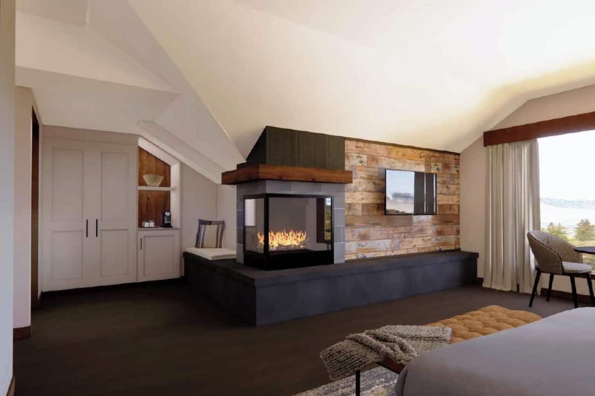 Suite Deluxe (Waterfall) | Zona de estar | Una televisión de pantalla plana, una chimenea