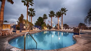 Seasonal outdoor pool, open 8:00 AM to 8:00 PM, pool umbrellas