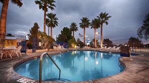 Seasonal outdoor pool, open 8:00 AM to 8:00 PM, pool umbrellas