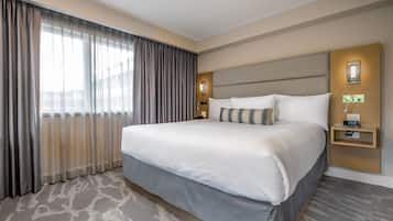 Suite, 1 King Bed with Sofa bed | 1 bedroom, pillowtop beds, in-room safe, blackout drapes