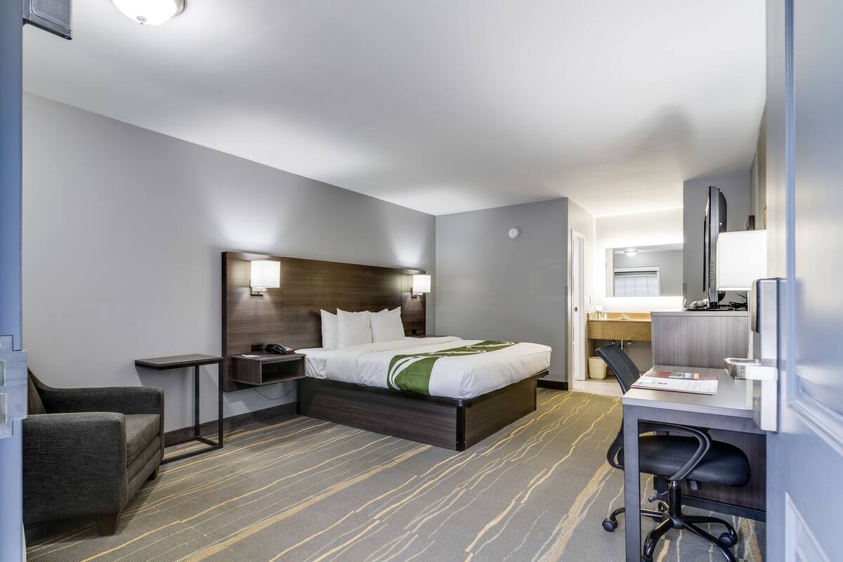 room, 1 king bed, non smoking | desk, blackout curtains, iron/ironing board, free wifi