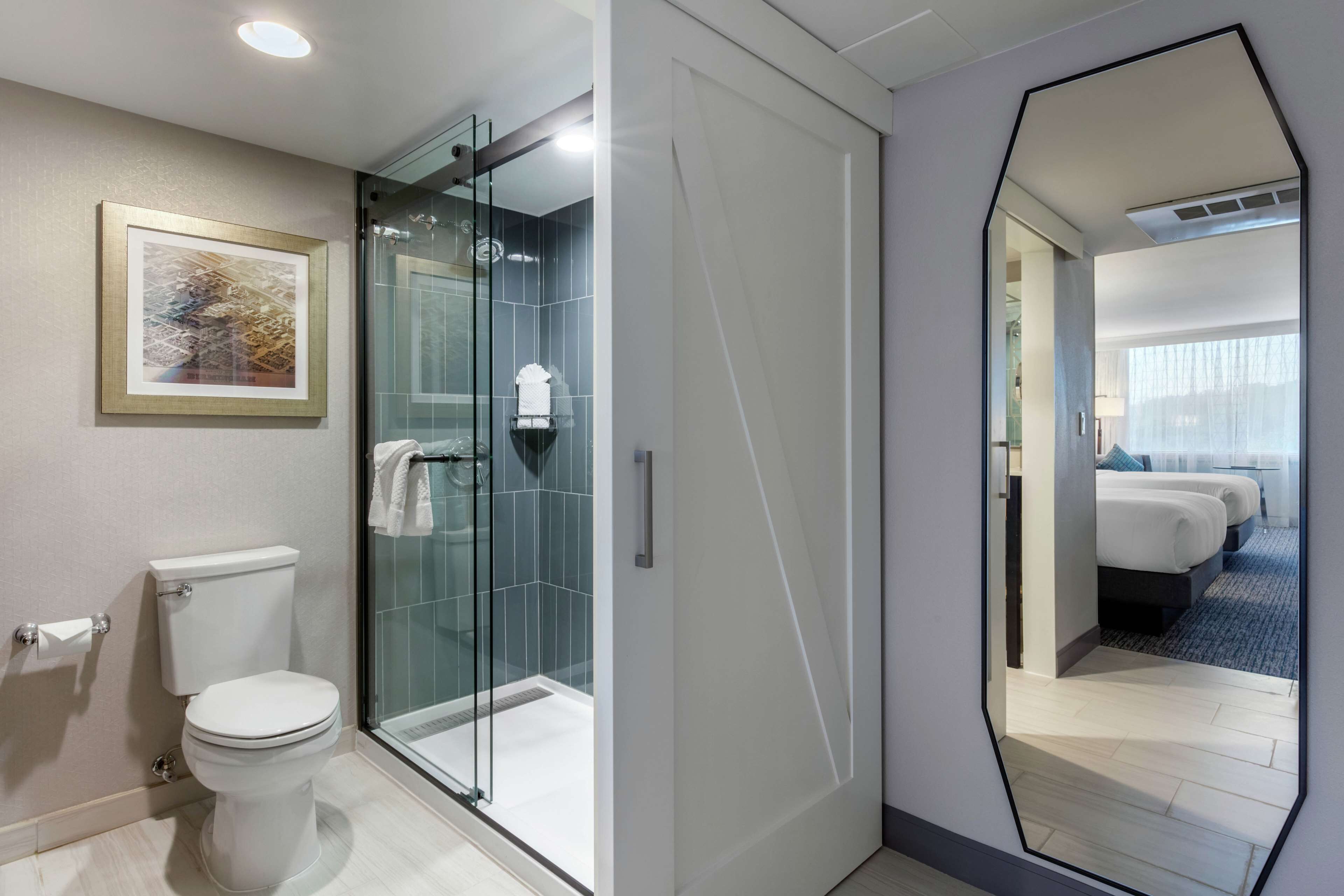 suite, 2 queen beds | bathroom | combined shower/bathtub, designer toiletries, hair dryer, towels
