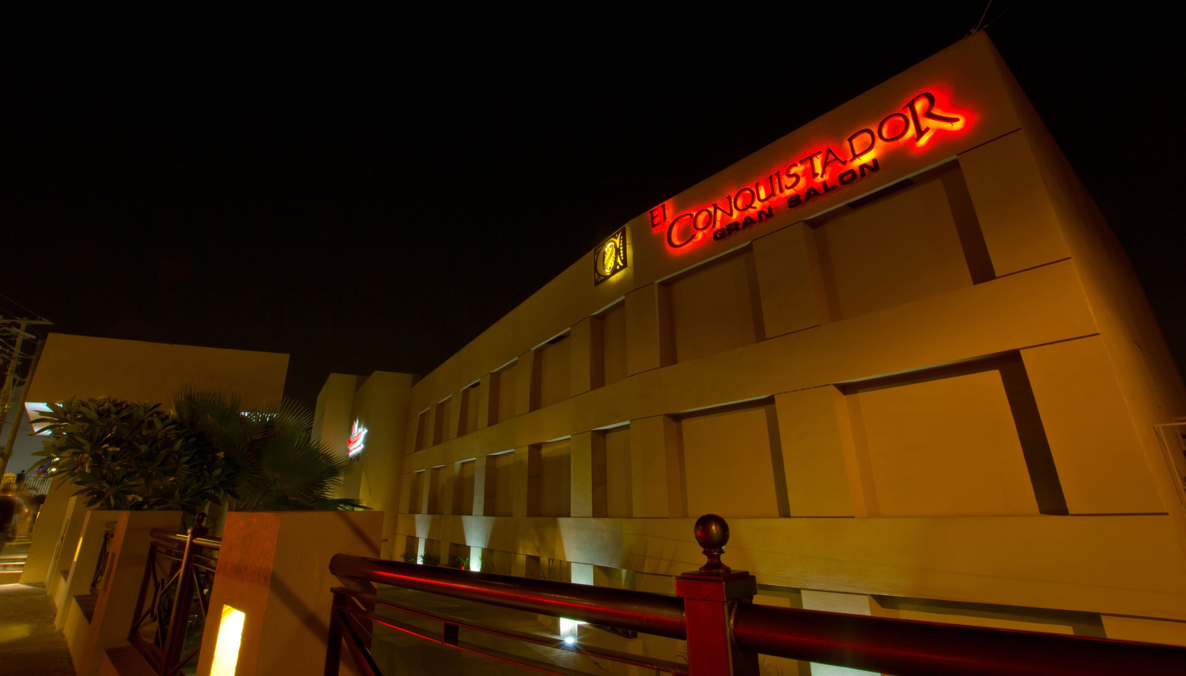 A building with a sign reading "El Conquistador Gran Salon".