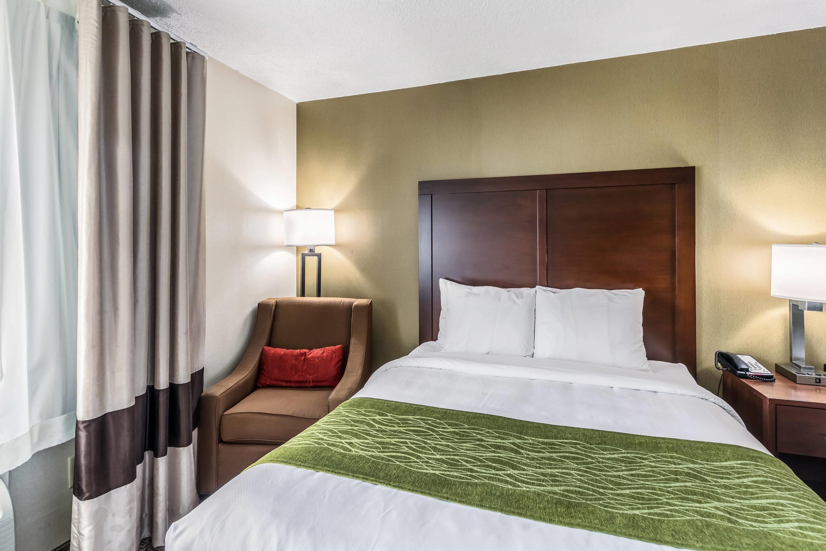 desk, blackout curtains, iron/ironing board, free cots/infant beds