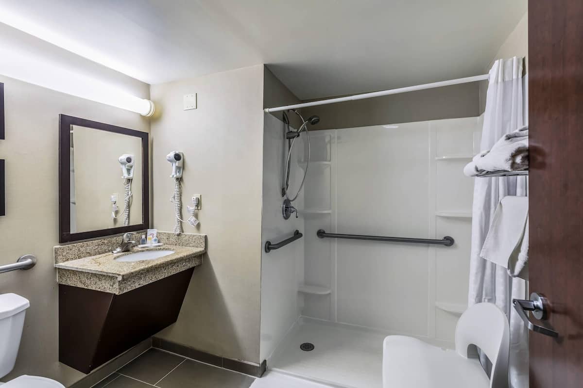 room, 1 king bed, accessible, non smoking | desk, blackout curtains, iron/ironing board, free cots/infant beds