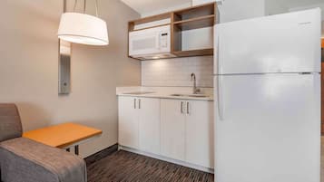 Desk, laptop workspace, blackout curtains, iron/ironing board