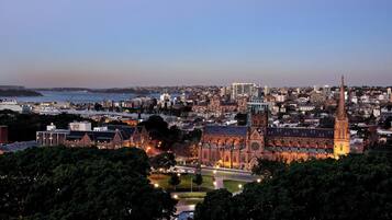 A cityscape with a prominent church and modern buildings.