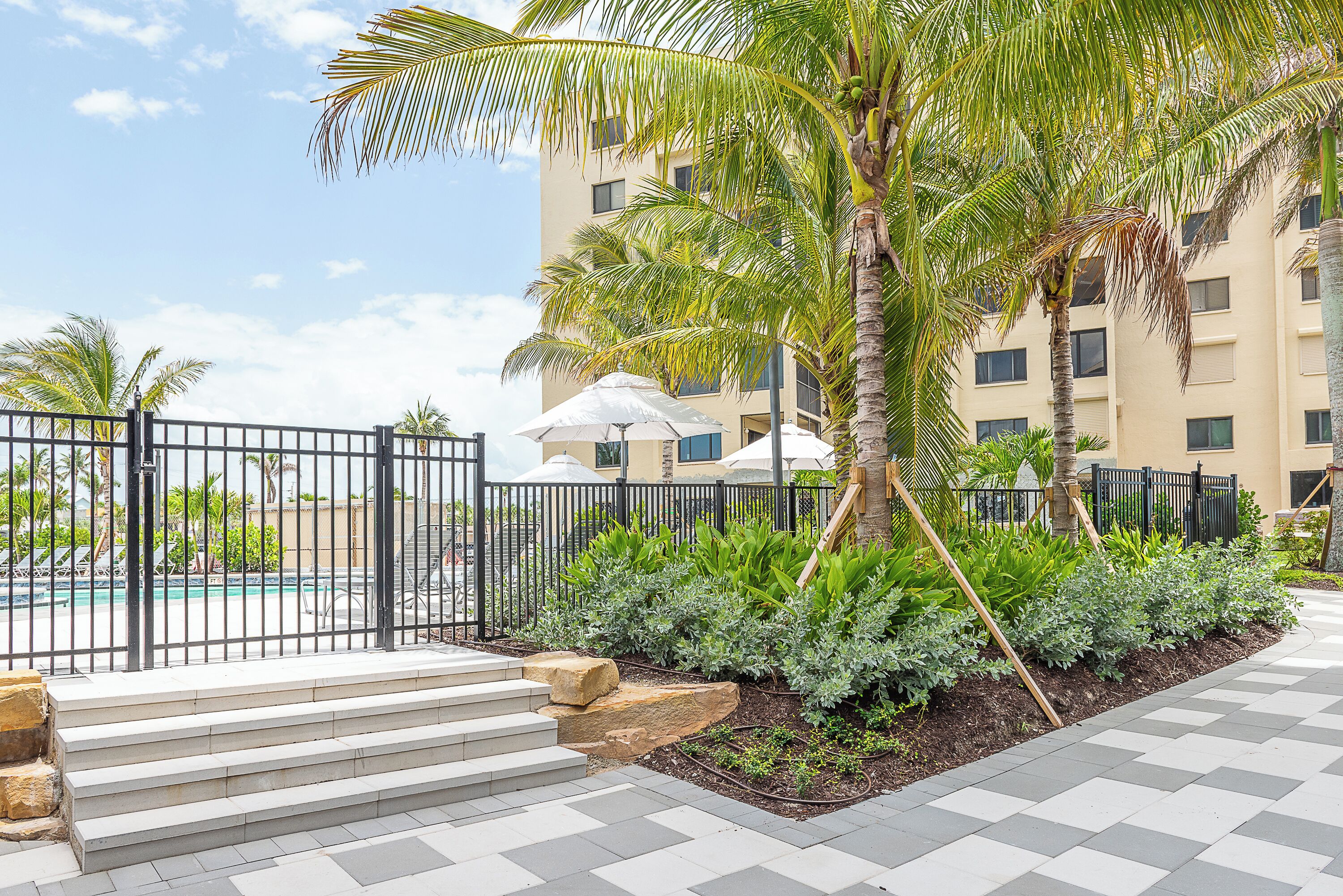 outdoor pool, pool umbrellas, pool loungers