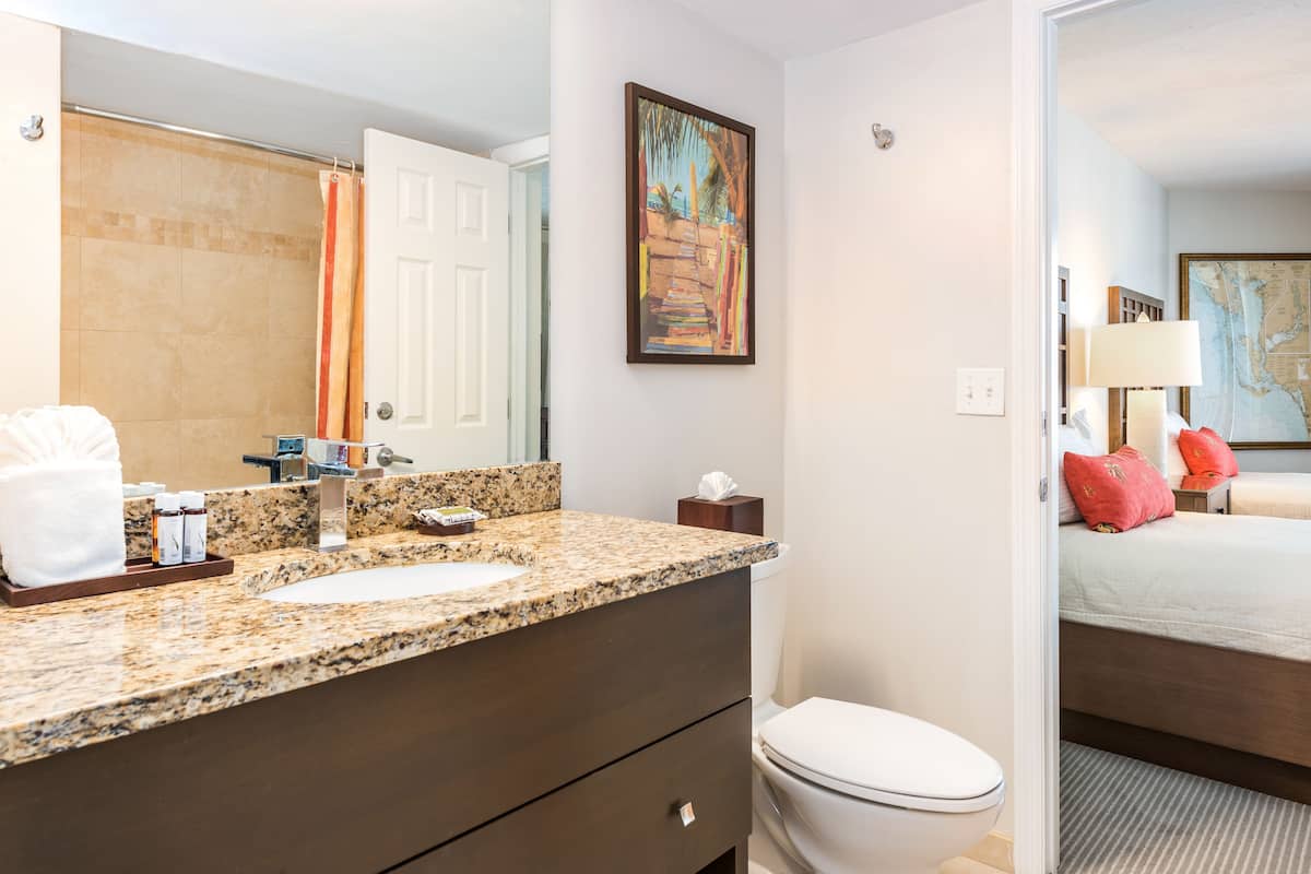 two bedroom condo | bathroom | shower, hair dryer, towels