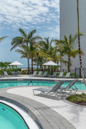 Outdoor pool, pool umbrellas, sun loungers