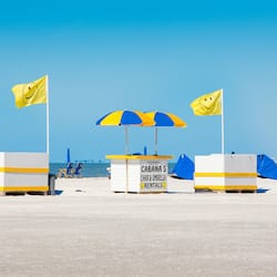 On the beach, sun-loungers, beach umbrellas, beach volleyball