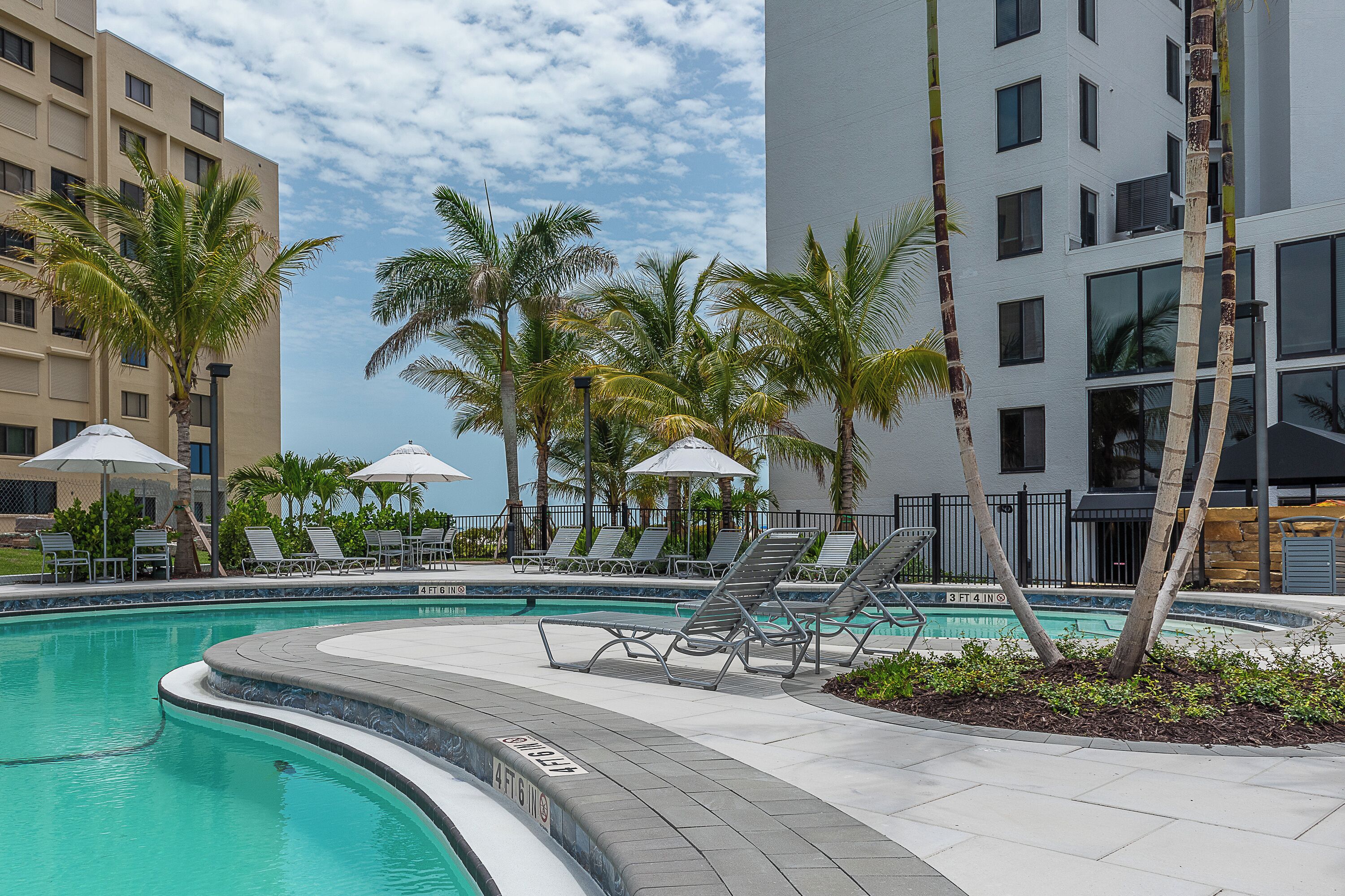 outdoor pool, pool umbrellas, pool loungers