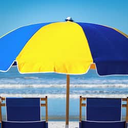 On the beach, sun-loungers, beach umbrellas, beach volleyball