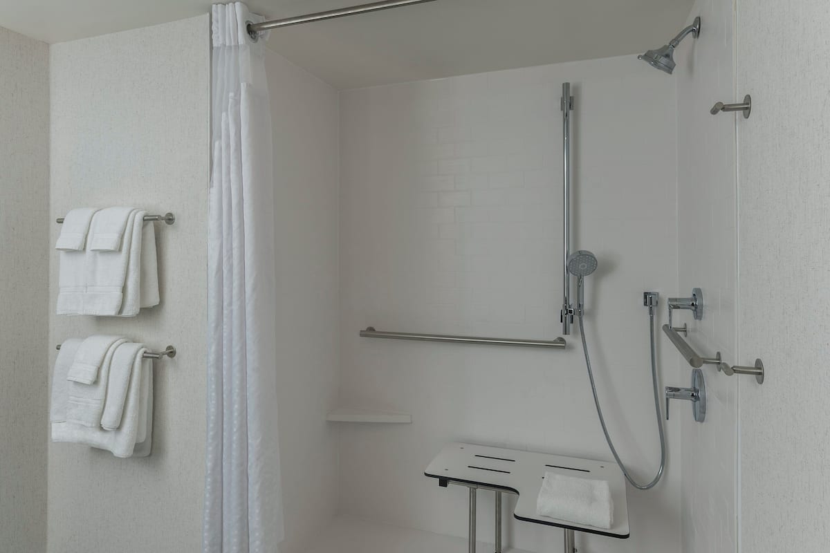 Hypo-allergenic bedding, desk, blackout drapes, soundproofing