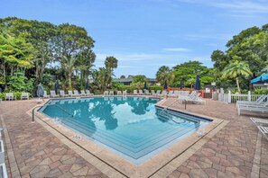 Outdoor pool, pool umbrellas, sun loungers