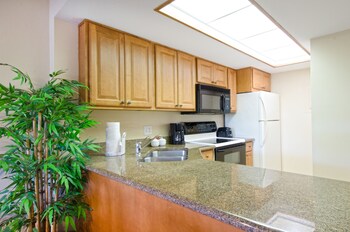 Fridge, microwave, stovetop, dishwasher at Park Shore Resort